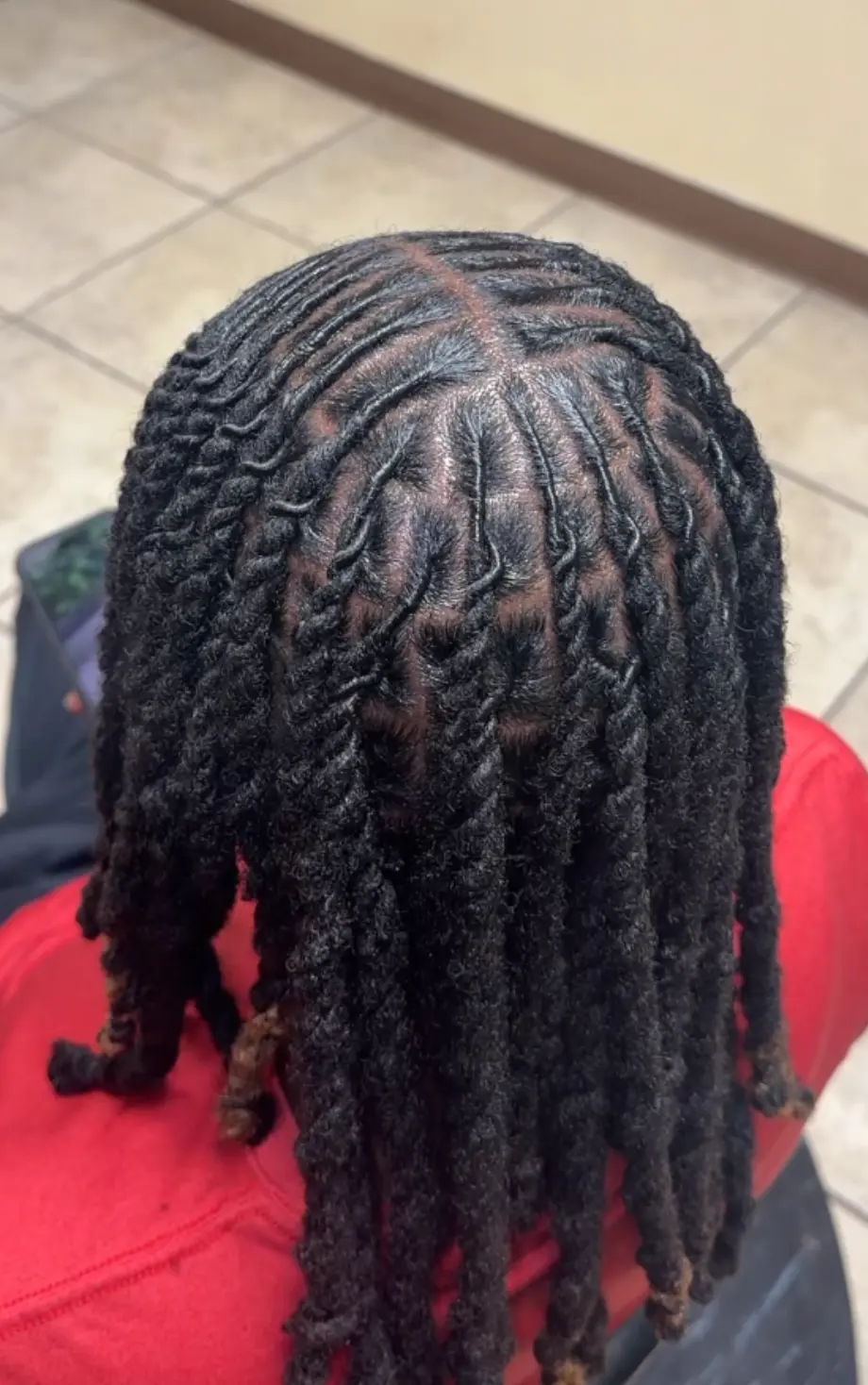 Loc styling work by Madi Locs