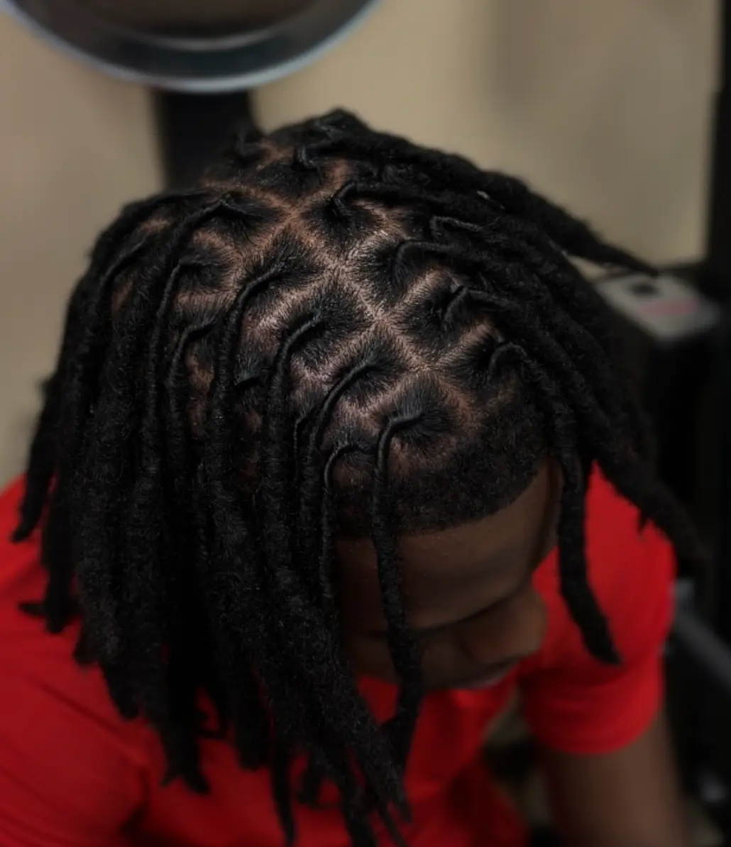 Loc styling work by Madi Locs