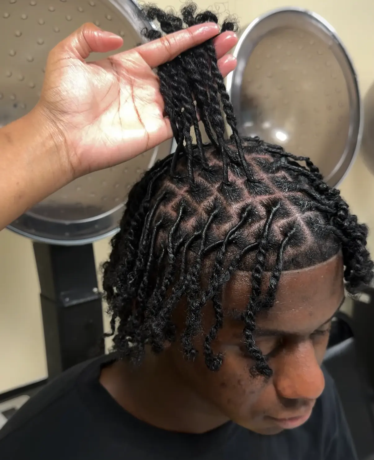 Loc styling work by Madi Locs